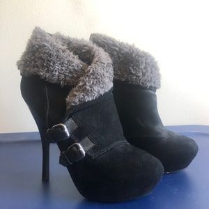 Black, tall, fur lined booties.